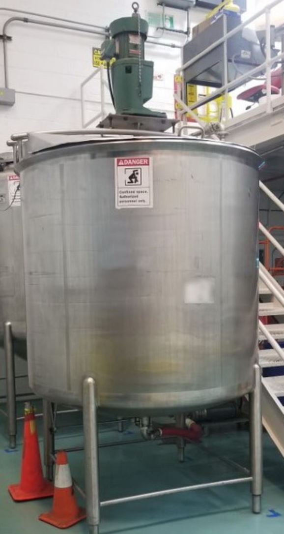 ***SOLD*** used 1,000 gallon Stainless Steel Mix Sanitary Tank built by CHERRY BURRELL. Includes Lightnin 1.5 HP, 230/460 volt bridge mounted center line agitator with dual stainless steel propellers, dished bottom with 2